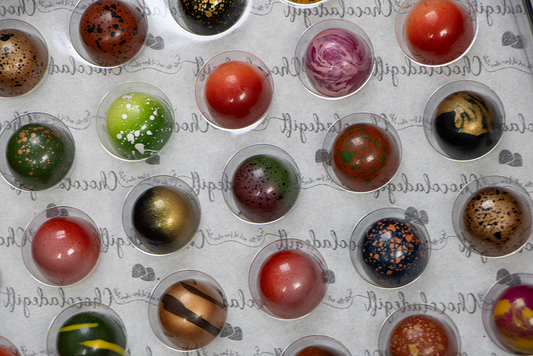 Bonbons bezorgd in Amersfoort: Luxe chocolade cadeaus door de brievenbus
